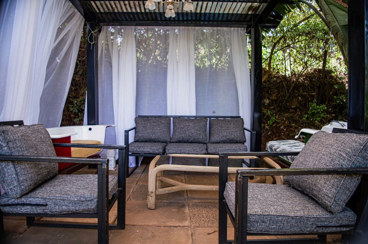 Outdoor seating area with curtains
